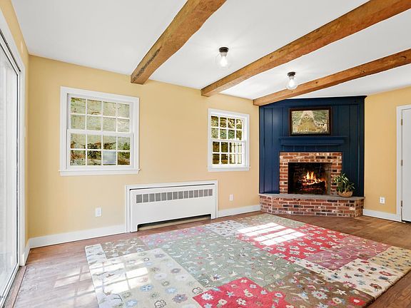 family room with fireplace open to yard 