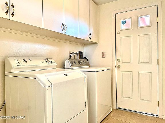 Laundry off kitchen.