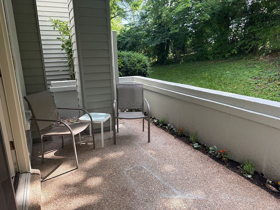 Patio off of the dining room with newly planted flowers.