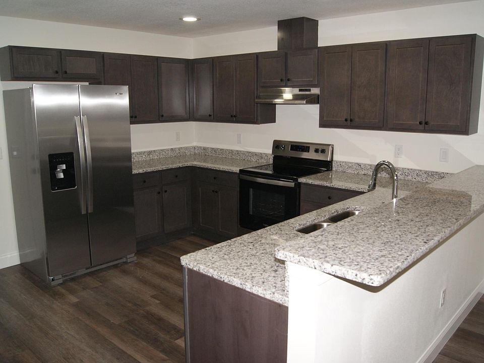 Large kitchen with plenty of cabinet space and counter tops