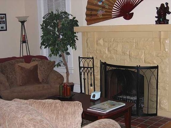 Living room w/wood burning fireplace