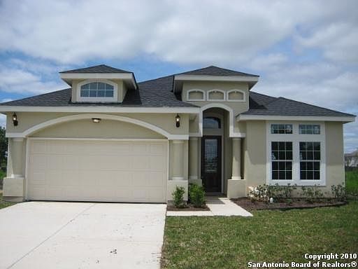 3919 BOGIE WAY
						:
						Lightly landscaped and roomy back yard.