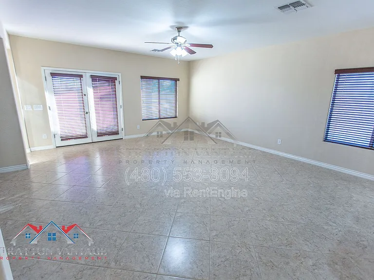 11751 W Daley Ln — Photo 20