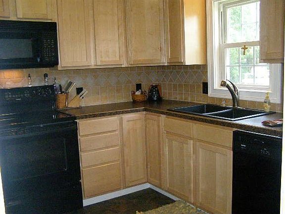 porcelain floors, new cabinets, countertops, appliances, etc