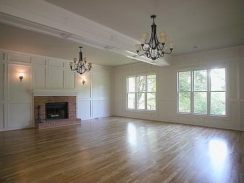 Huge Family Room w/ Fireplace and Wood Paneling