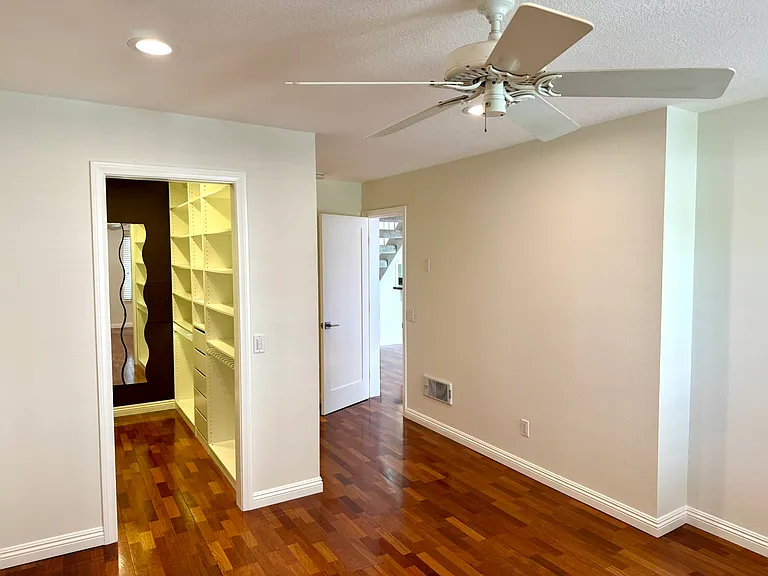 Primary bedroom, walk-in closet