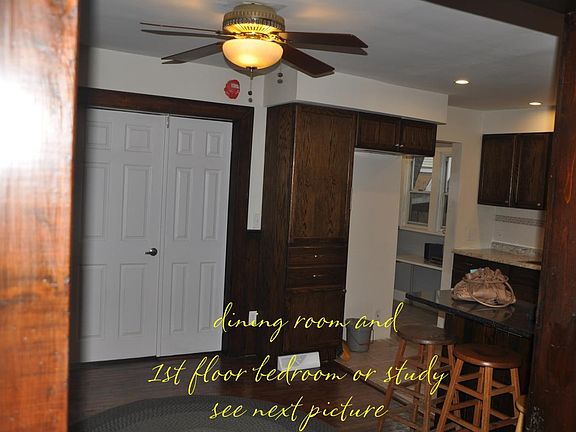 study used as a bedroom viewed from dining room
