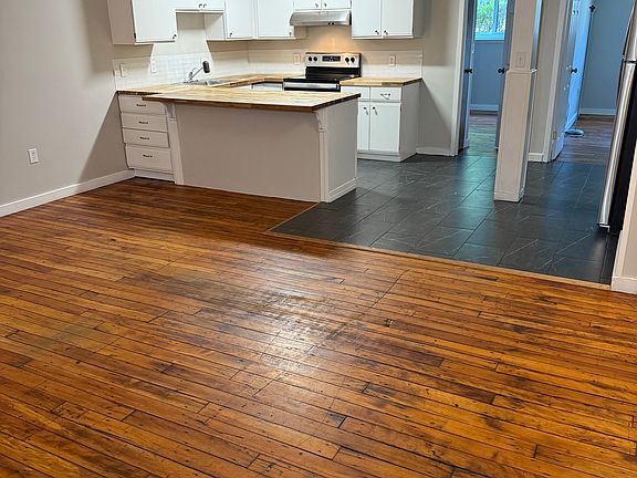 Living room facing kitchen