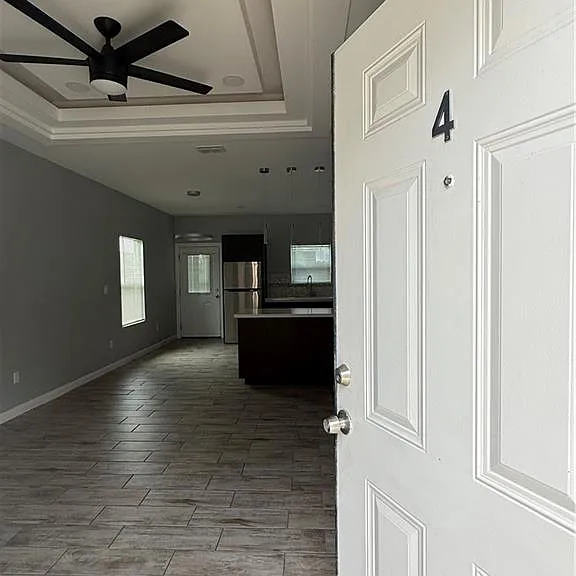 1317 S Xanthia St — Photo 3