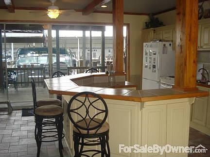 First Floor Entertainment Room
						:
						Includes kitchen and half bath.