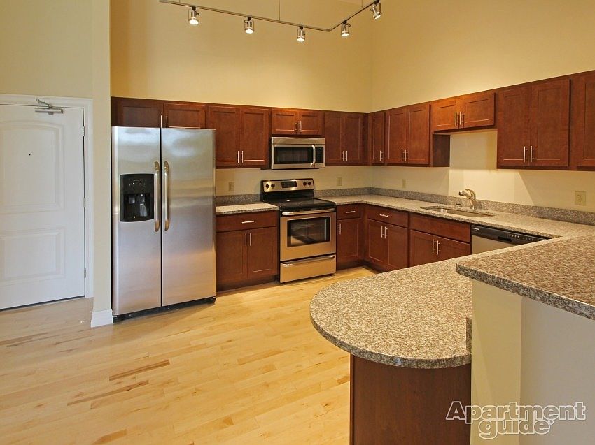 Kitchen featuring brand new stainless steel appliances and g