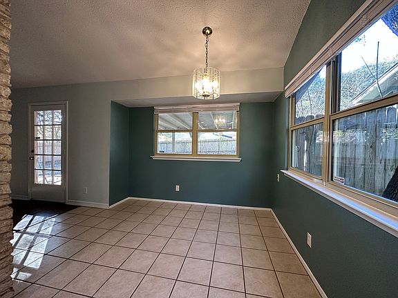 Dining area open to kitchen and living room