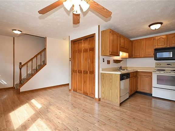 The warm wood tones add a touch of tradition to this contemporary property.