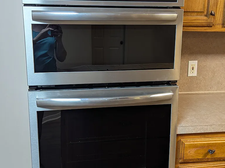 The oven is a top-of-the-line Frigidaire double convection microwave oven combo with sophisticated baking modes controlled by a color touchscreen. Celebrate your new home by being the first to bake a cake in this spectacular oven!