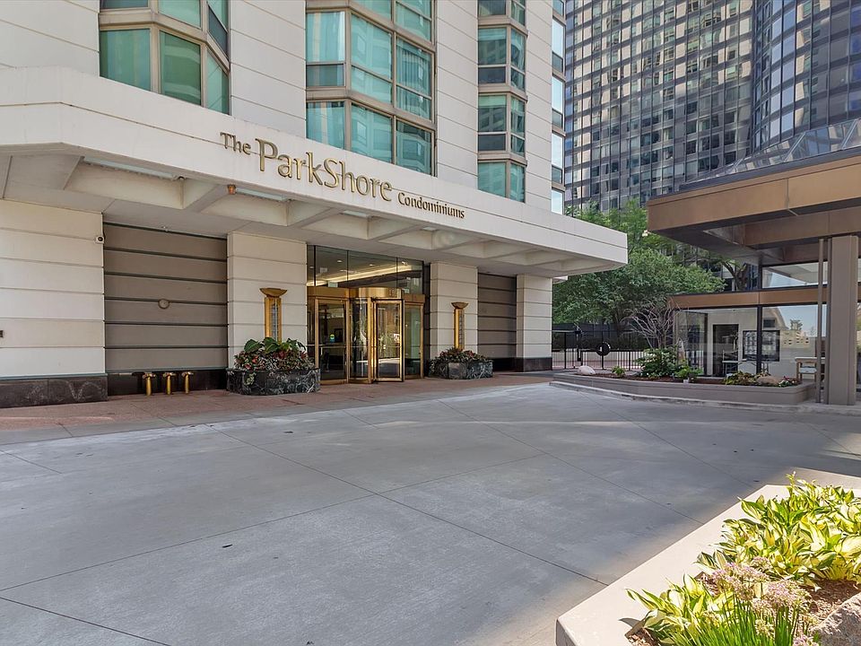 The front exterior of the elegant Parkshore Condominiums