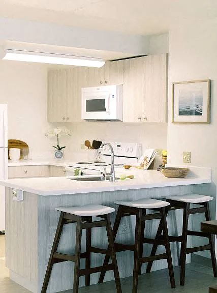 Kanekapolei Collection Kitchen Area with bar counter and seating