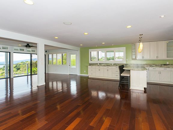 Open Floor Plan with Rich Wood Floors