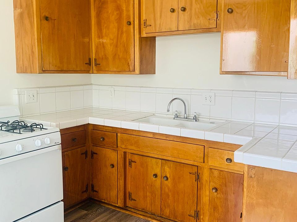 The kitchen stove included laminated flooring