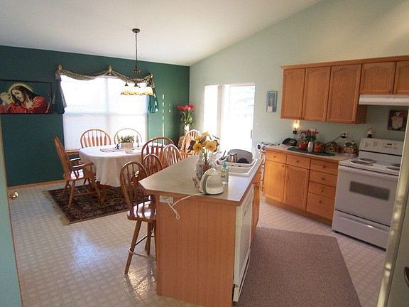 Large kitchen with island, and skylights!