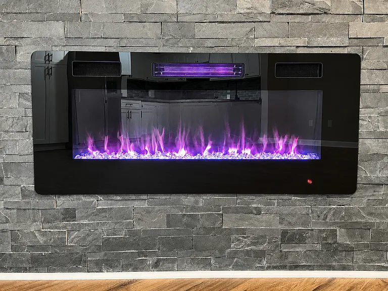 Electric fireplace with touchscreen for warmth, flame color, rock color, & flame speed.