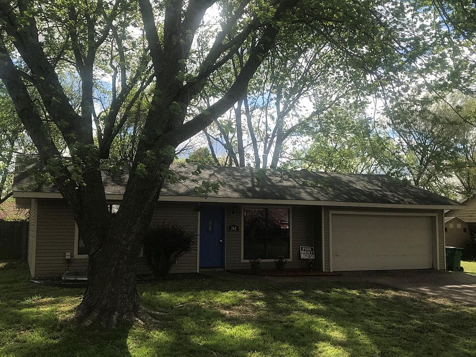 Quiet, tree shaded site w/ fenced backyard and two car attached garage