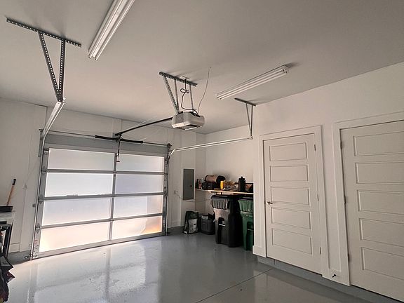 Private 1 car garage with 2 extra storage closets