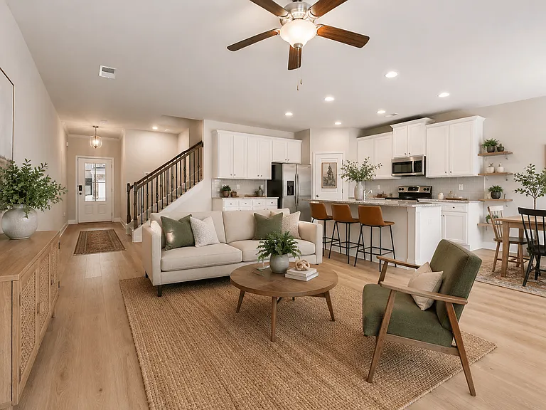 Spacious living room filled with abundant natural light.