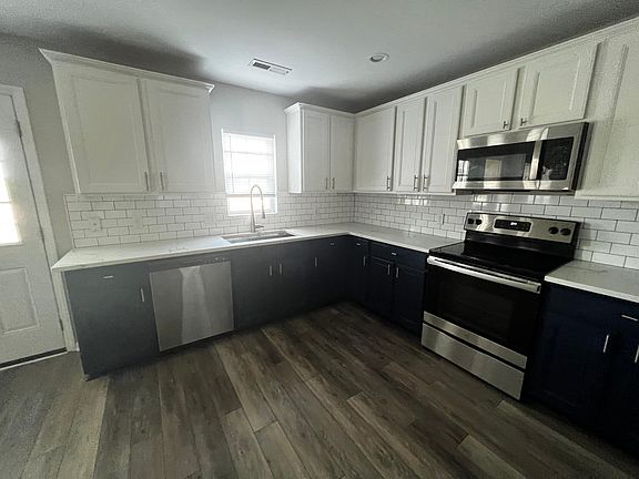 Kitchen window to backyard.