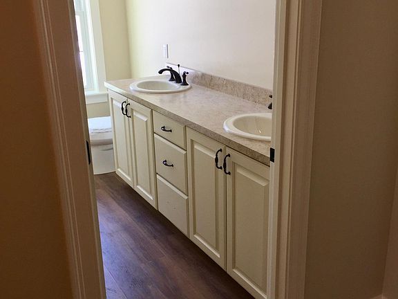 Bathroom. Photo is prior to full counter width mirror being installed.