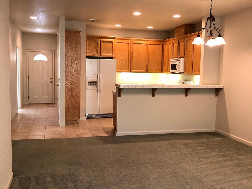 Entry door, kitchen, great room.