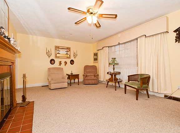 Living Room looking at Dining Area and Front Door.