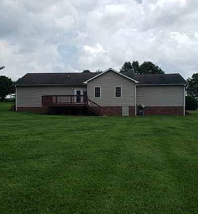 BACK SIDE WITH LARGE DECK