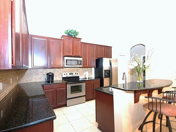 5th image of 8514 White Poplar Dr