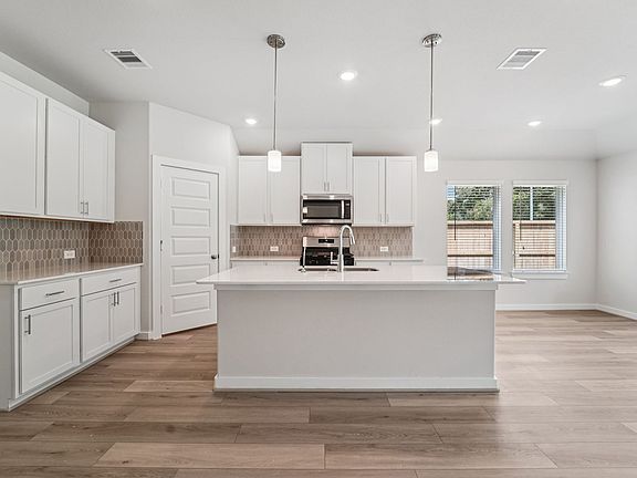 The Henderson floorplan in Kingdom Heights of Rosenberg, TX.