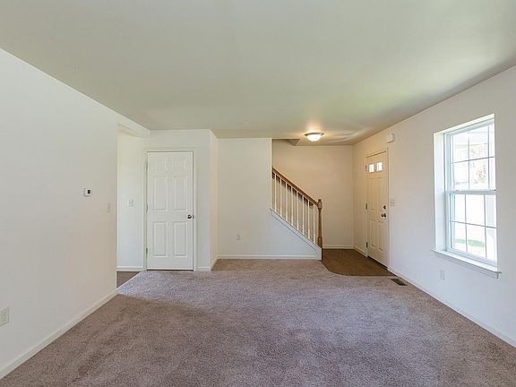 Family room and basement/garage entrance.