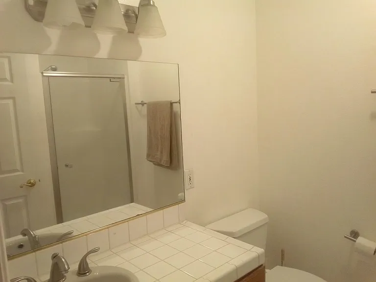 3/4 bath off kitchen.