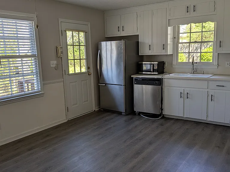 Kitchen with new dishwasher and stove