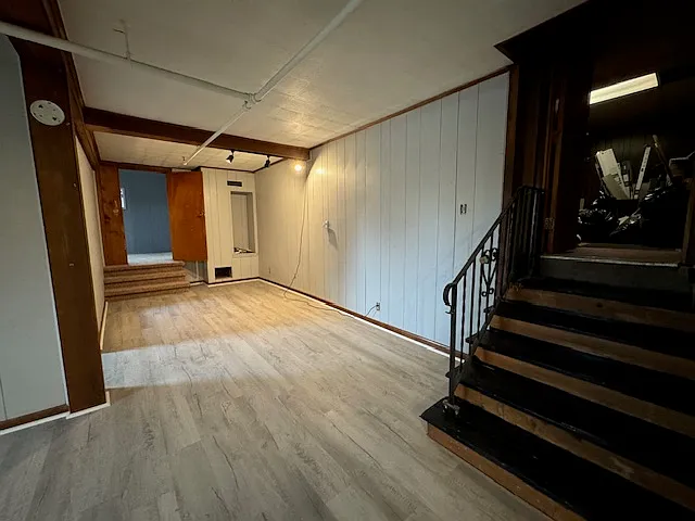 front entrance stairs leading into living room