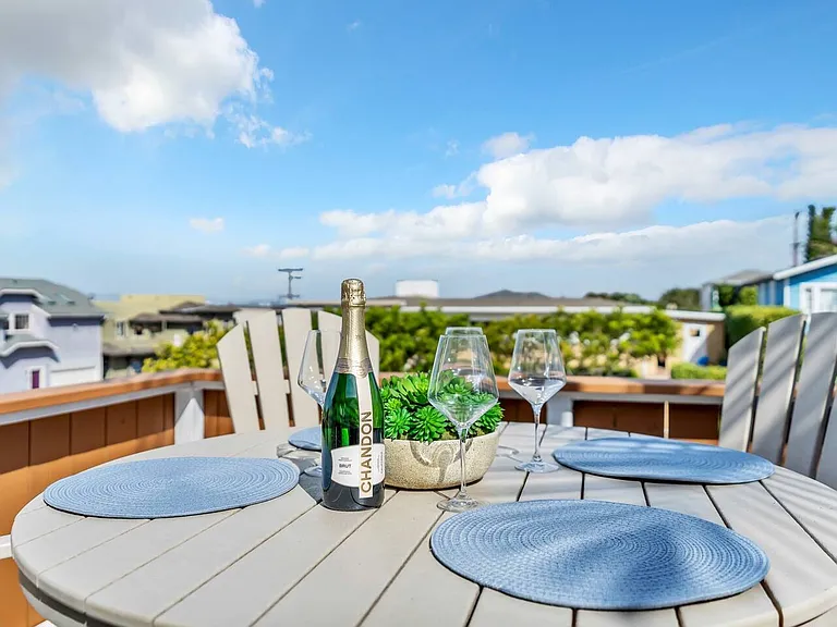 Second-floor terrace with comfortable outdoor seating and fantastic views. The perfect spot to unwind.