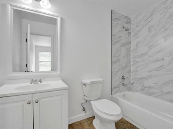 Updated bathroom with modern fixtures and a bright, clean finish.