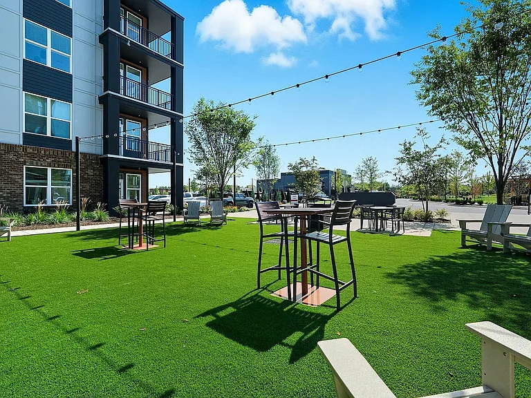 Enjoy fresh air and relaxation in our beautifully landscaped event lawn