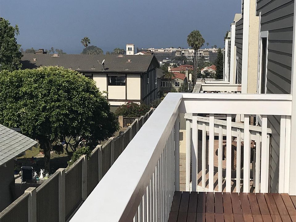 View to ocean from large upper deck with teak floor and gas 