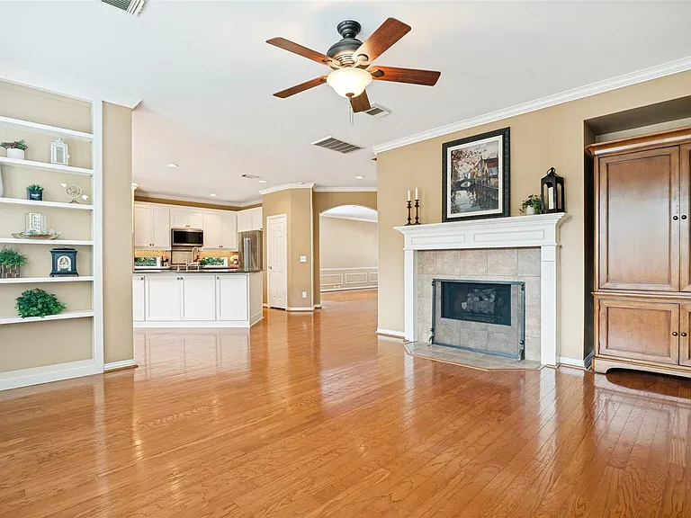 Chimmeny family room overlooking the kitchen