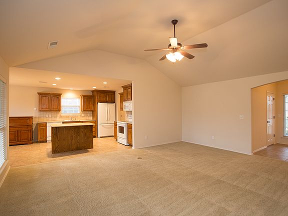 View of kitchen with eat at breakfast bar from the great room.