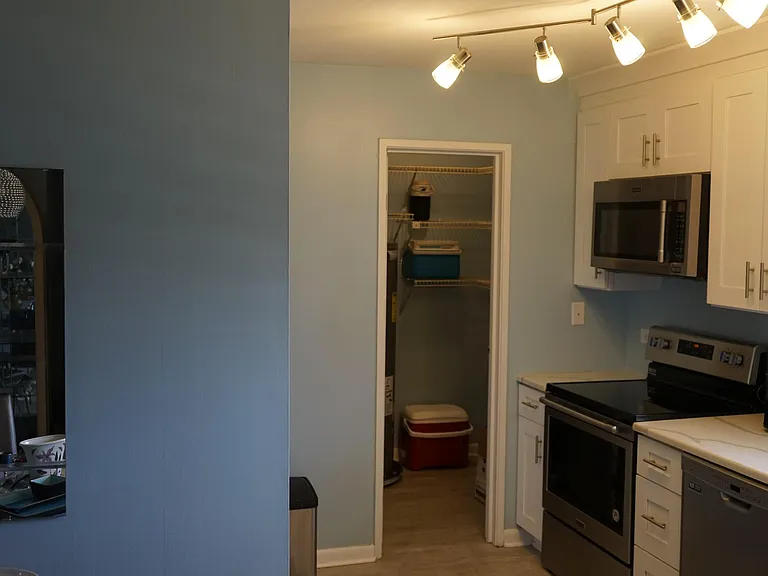 Walk in pantry off kitchen.