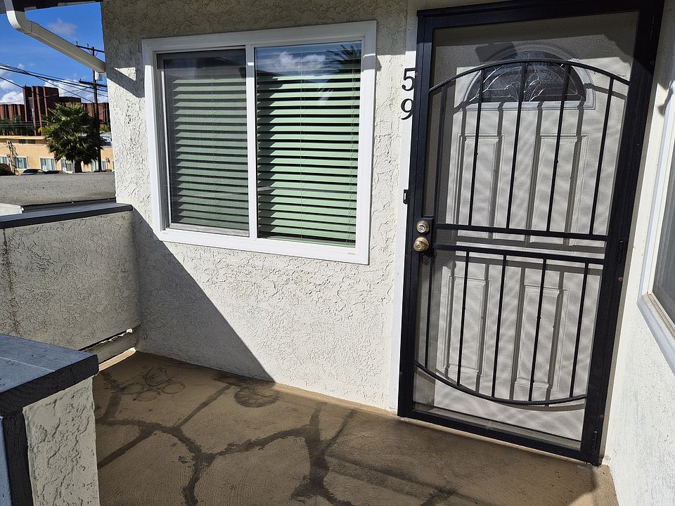 Front door with small balcony
