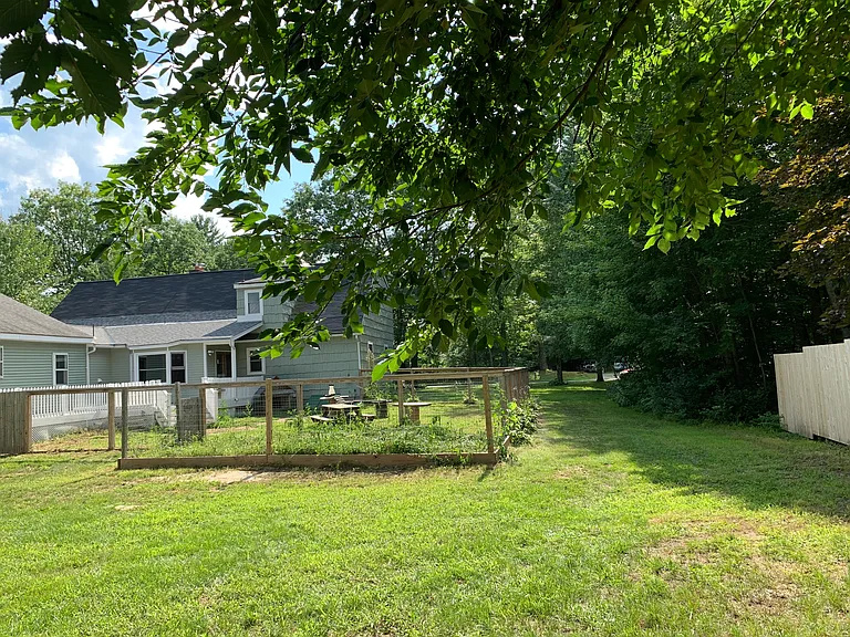 Large dog yard. Garden space.