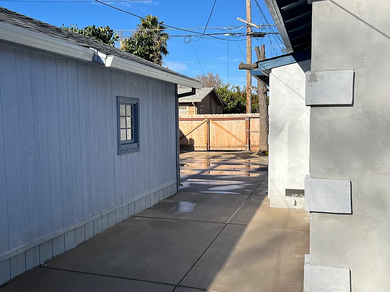 Western walkway facing north maintenance shed on the left/west.