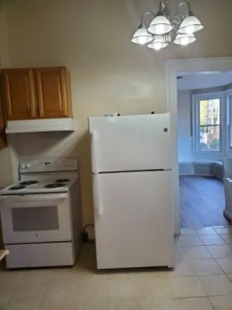 New kitchen stove and refrigerator