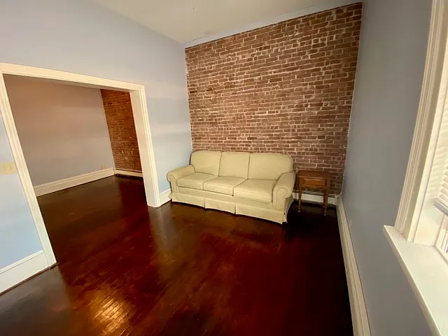 Brick interior wall adds great character.